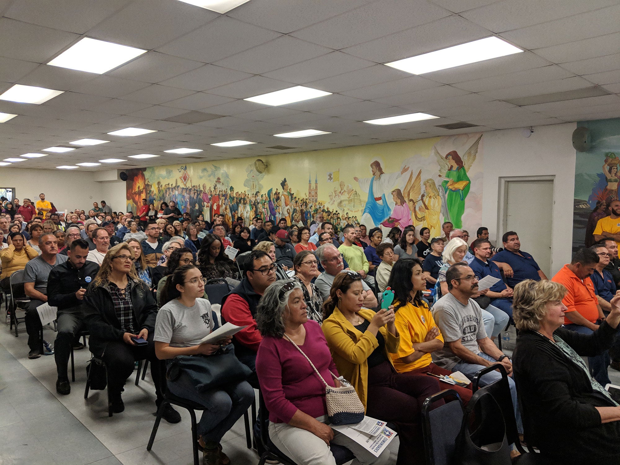 Hundreds of residents packed a church hall in San Bernardino, Calif., in 2019 to hear community leaders discuss a huge new logistics center planned for the town’s airport. (Center for Community Action and Environmental Justice)