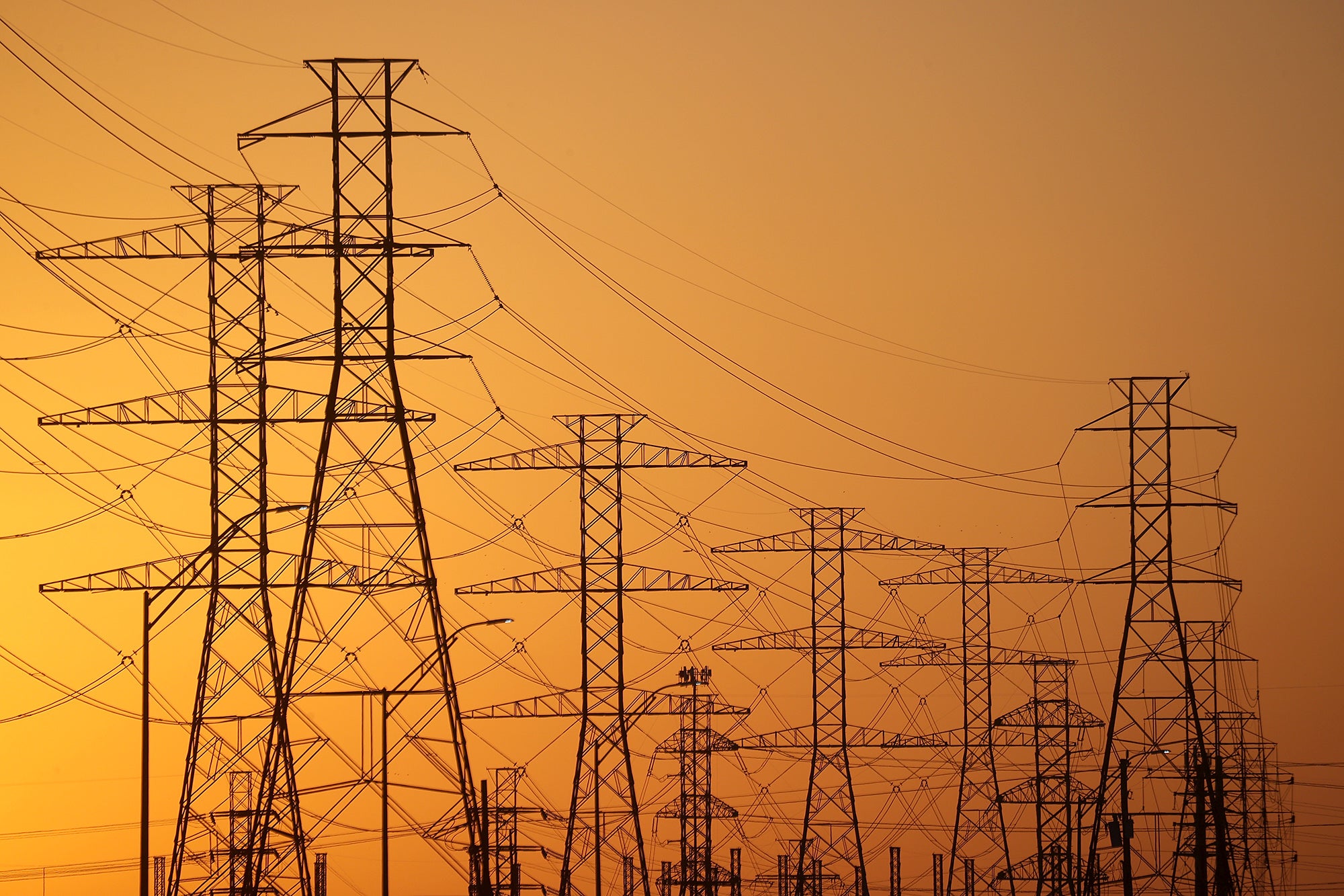 High voltage transmission towers in Houston, TX. (Justin Sullivan / Getty Images)