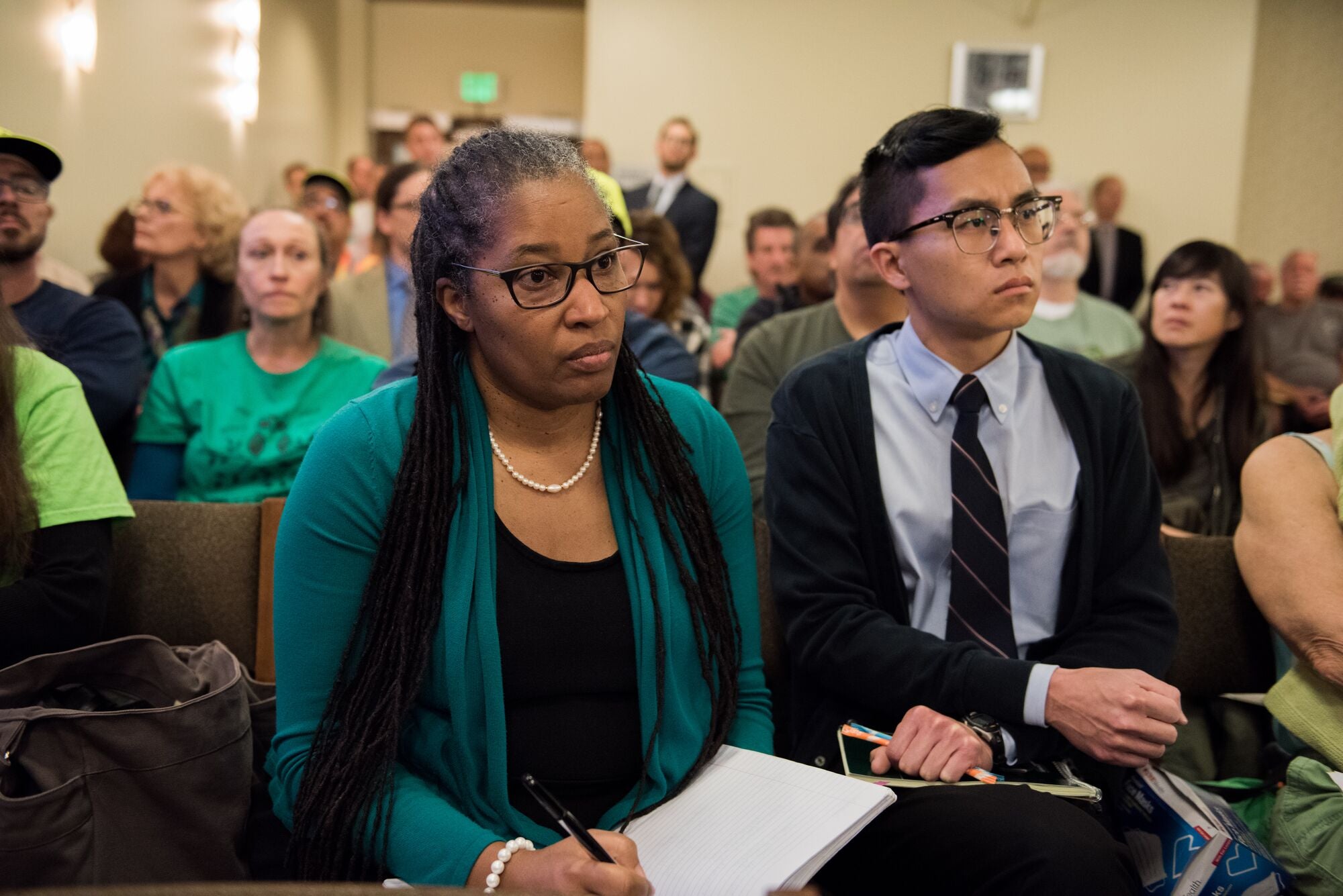 Earthjustice attorneys Angela Johnson Meszaros and Byron Chan at one of several hearings held on the proposed Grayson gas plant in Glendale, Calif. These packed hearings often went on into the late hours of the night.