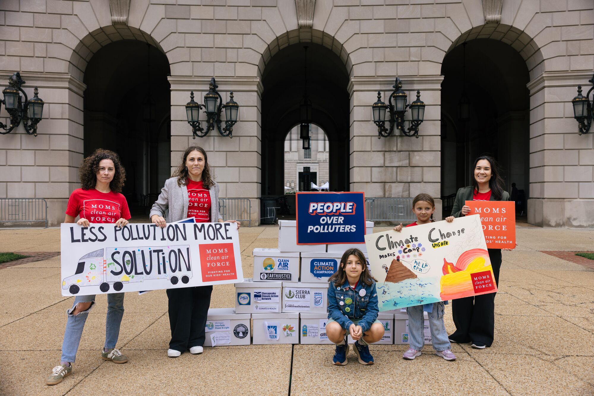 People take petitions to the Environmental Protection Agency following a Climate Action Campaign press conference about the EPA’s Climate Chaos Plan and Clean Vehicle Rollback. CREDIT: Alyssa Schukar for Earthjustice
