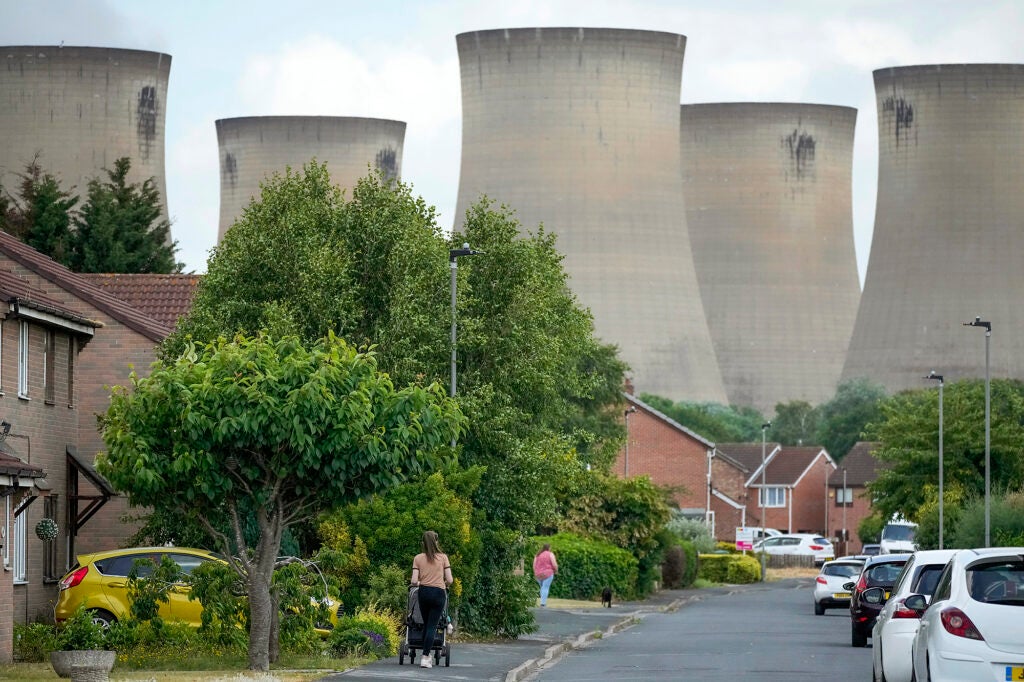 Homes stand near the Drax Power Station in the rural constituency of Selby and Ainsty on June 19, 2023, in Selby, England. (Christopher Furlong / Getty Images)