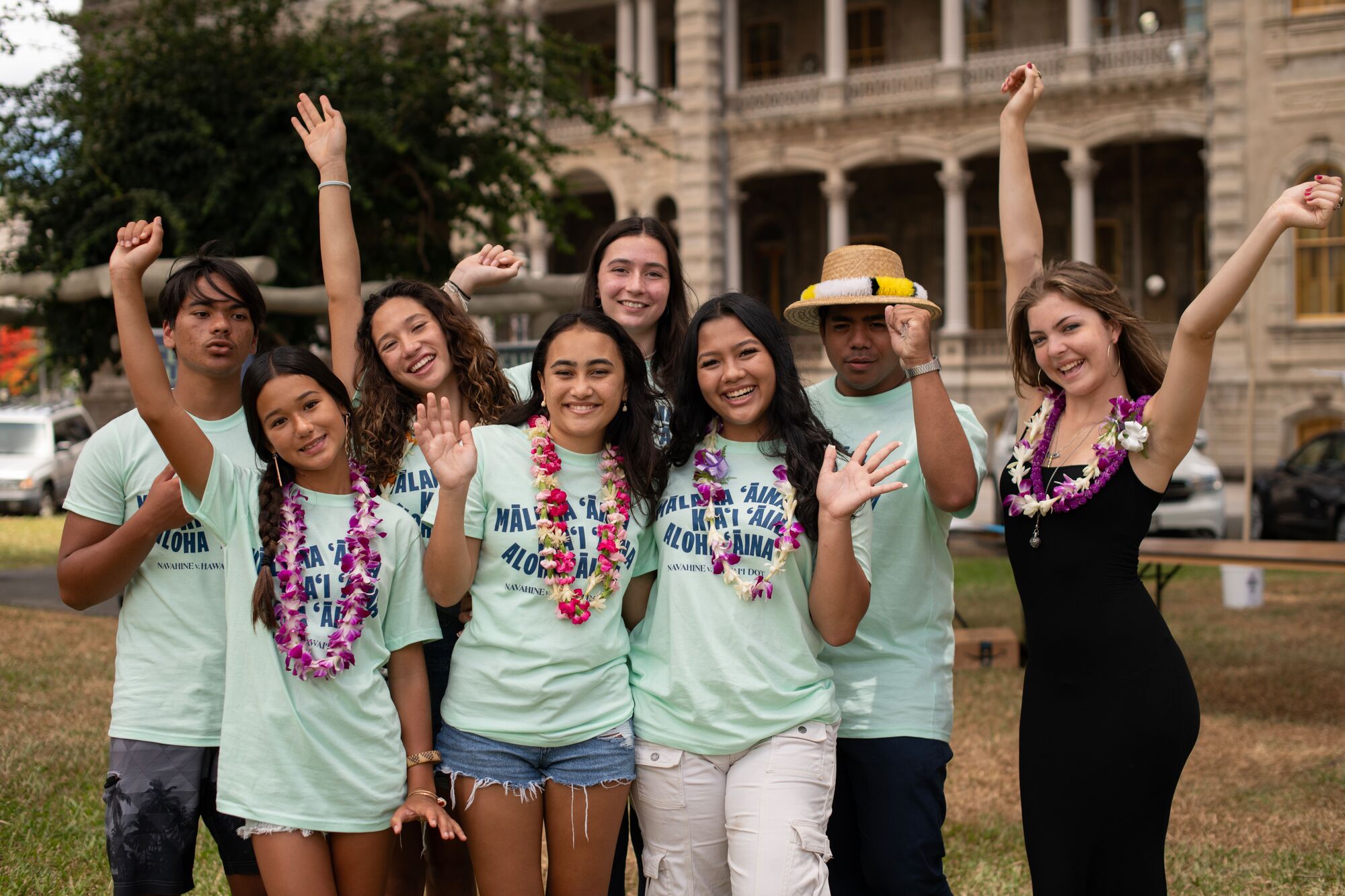 Eight of the thirteen youth plaintiffs from the Navahine v Hawai’i Department of Transportation youth climate case at the settlement celebration at ‘Iolani Palace on June 24, 2024.