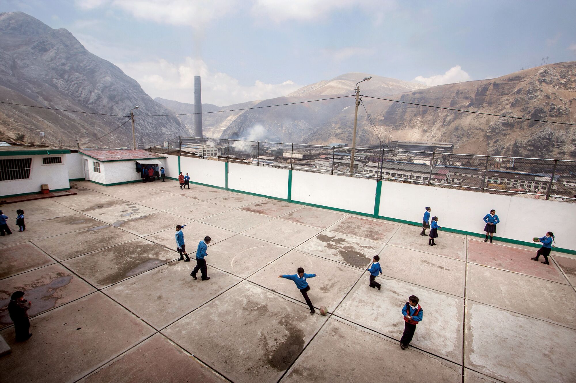 Children playing near the Doe Run Mining complex, of US Renco Group, in La Oroya, Peru, in 2008.