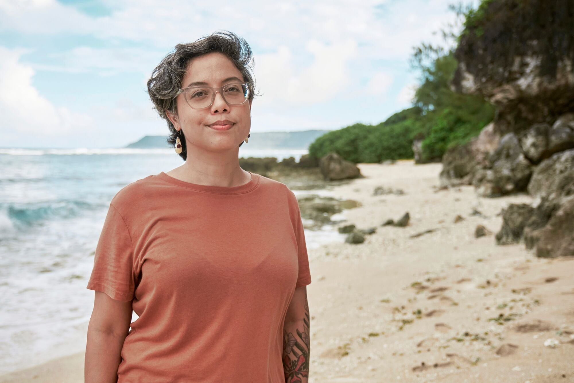 Monaeka Flores, on Inapsan Beach on Guam, where her family had ranched the land for generations.