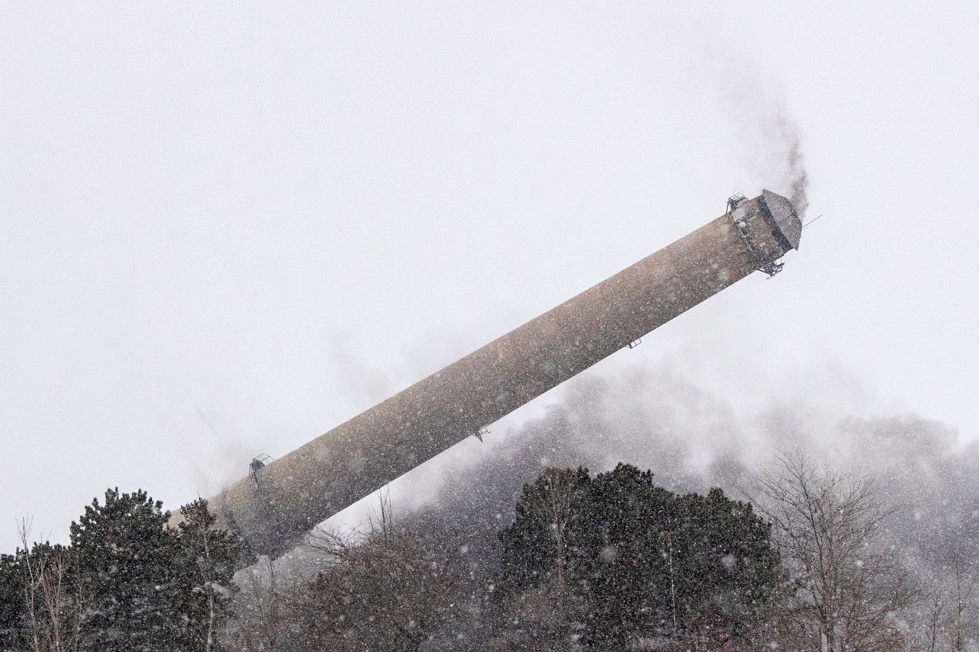 Michigan Coal Implosion A smoke tower falls to the ground during a snow storm