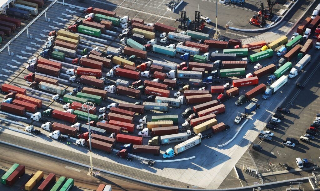 Shipping containers stand attached to trucks at the Port of Los Angeles, the nation's busiest container port, on September 18, 2018 in San Pedro, California. (Mario Tama / Getty Images)