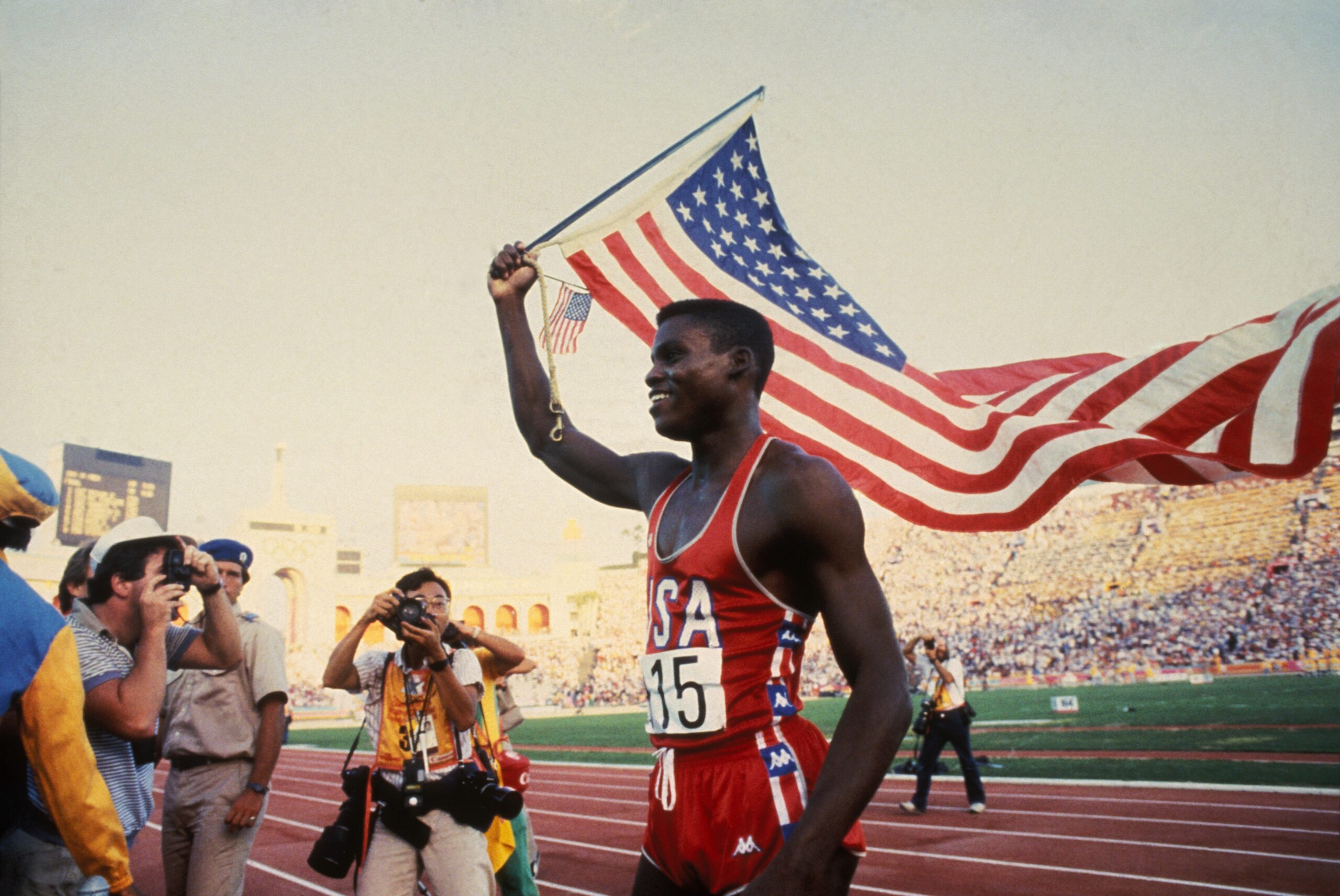 American athlete Carl Lewis won the 100m gold medal at the Los Angeles Olympic Games in August 1984 in Los Angeles, California.