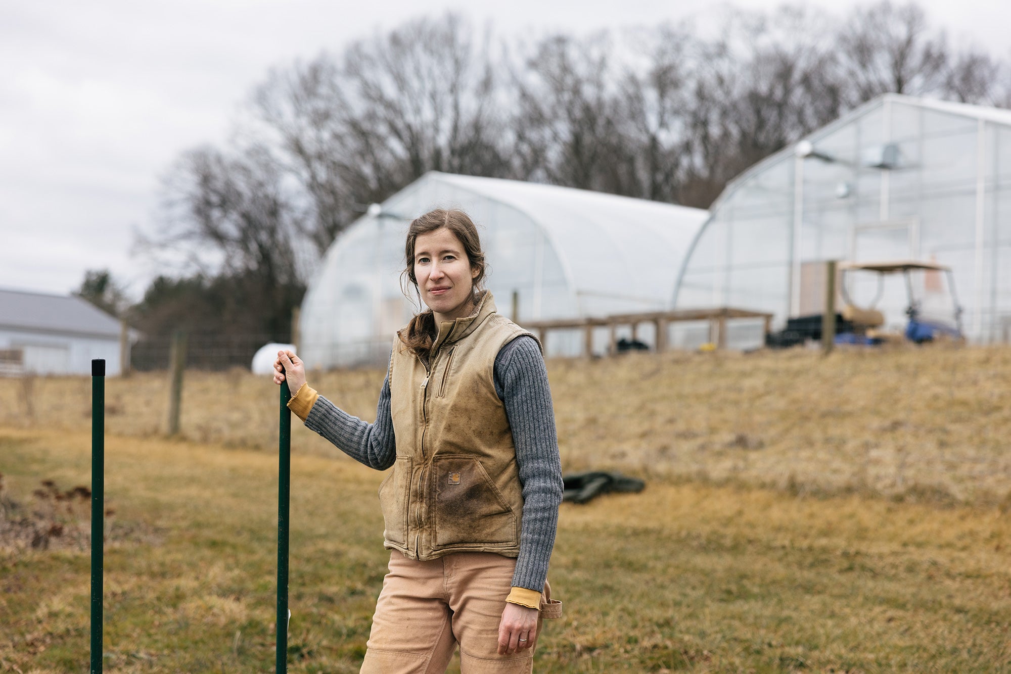 Butterbee Farm Laura Beth Resnick of Butterbee Farms stands in front of covered greenhouses on her farm in White Hall, Maryland.