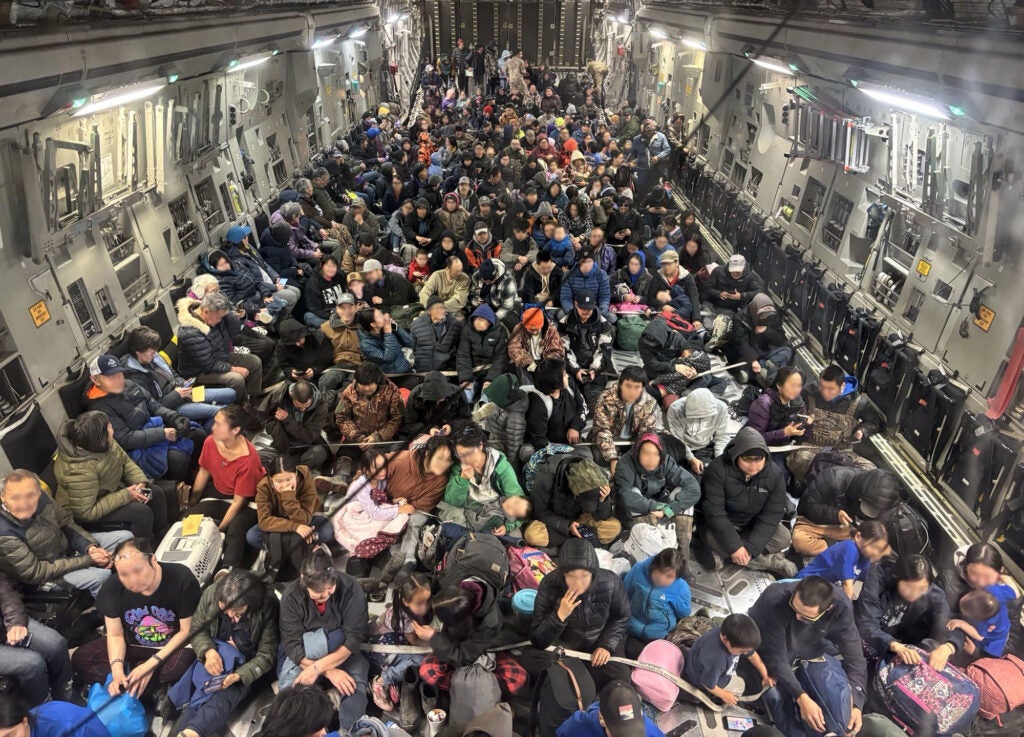 Hundreds of Western Alaska residents were evacuated by military transport plane after severe storms brought destruction to the region. (Alaska National Guard photo by Staff Sgt. Joseph Moon)