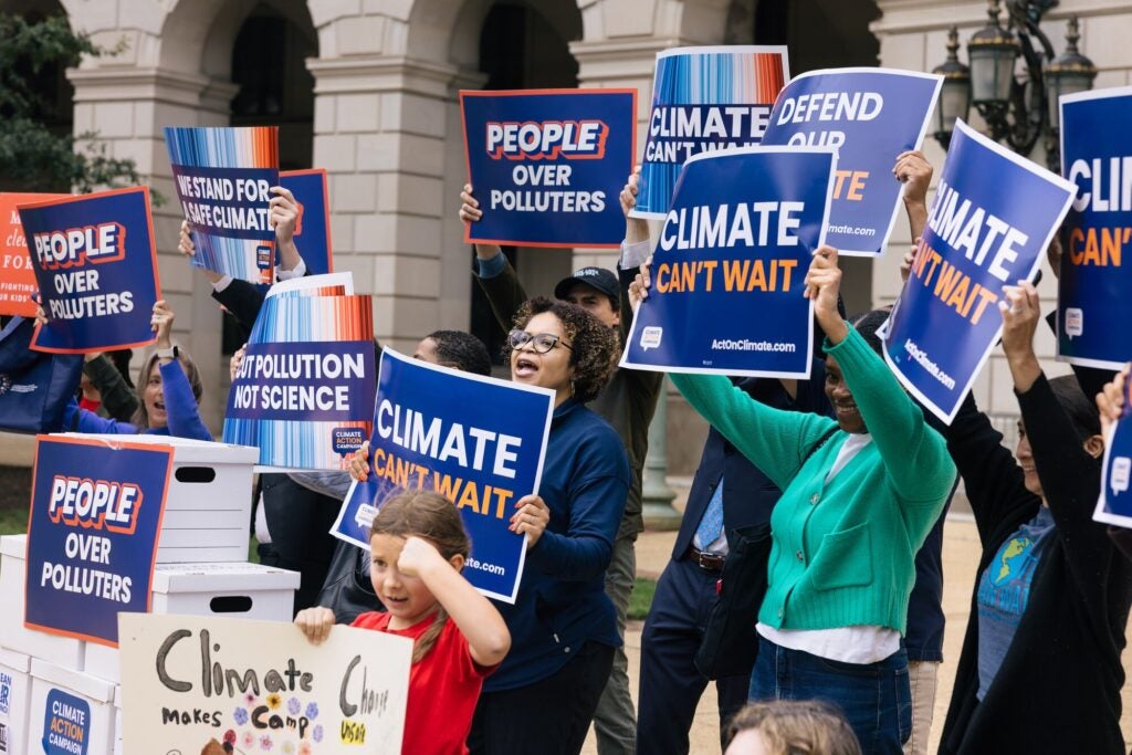 Organizers deliver more than 250,000 petitions to the U.S. Environmental Protection Agency opposing the rollback of federal greenhouse gas regulations. (Alyssa Schukar for Earthjustice)