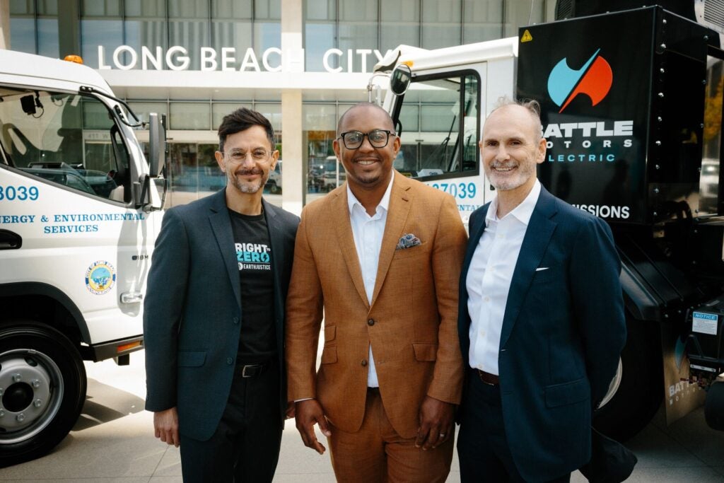 Earthjustice attorney Fernando Gaytan, Long Beach Mayor Rex Richarson, and Joe Sullivan of IBEW at a City of Long Beach conference unveiling its new EV garbage trucks in Long Beach, Calif. (Stella Kalinina for Earthjustice)