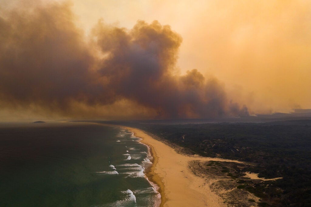 Smoke from an out-of-control summer bushfire on the south coast of NSW, Australia. (Lindsay Imagery / iStockphoto)
