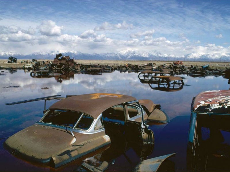 In 1974, abandoned automobiles and other debris clutter an acid water- and oil-filled five-acre pond near Ogden, Utah. Without strong environmental safeguards, the interests of polluters will trump public health every time.
(U.S. NATIONAL ARCHIVES AND RECORDS ADMINISTRATION)
