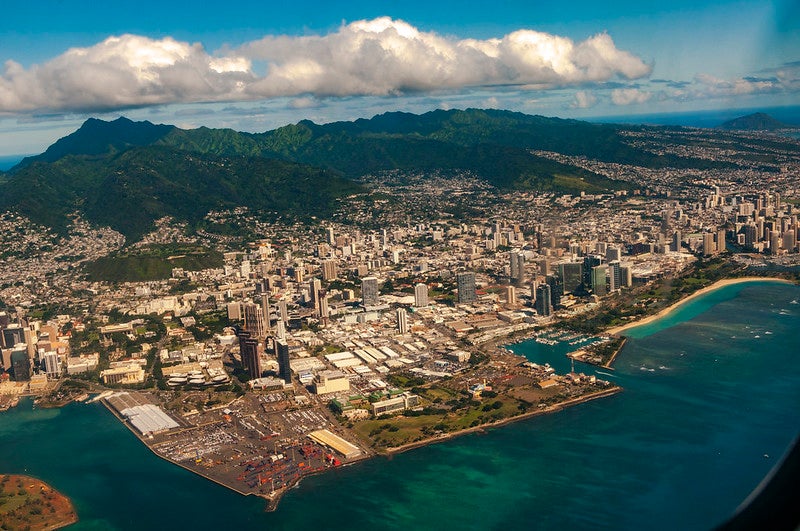 An aerial shot of O‘ahu, where the Navy's Red Hill fuel tanks recently contaminated the drinking water supply for over 92,000 residents.
(BirdsEyePix / CC BY-SA 2.0)
