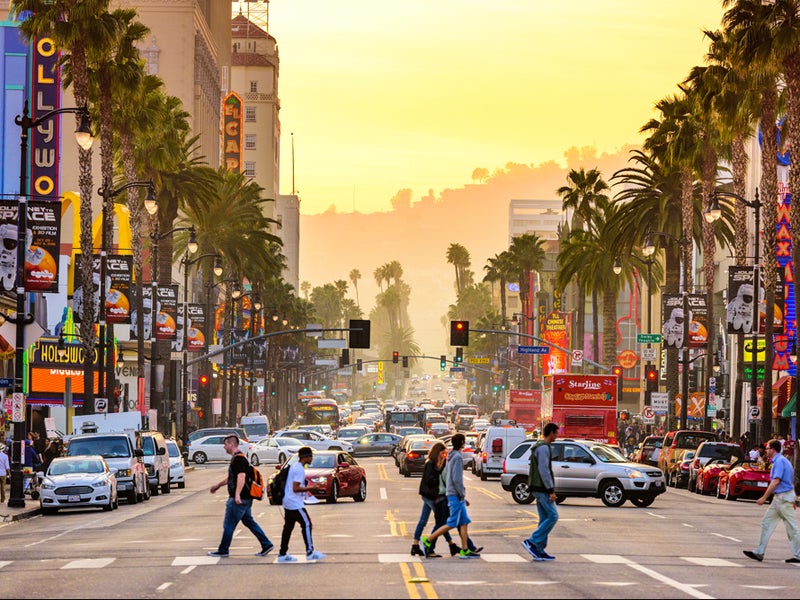 While President Trump tries to roll back America’s efforts to fight climate change, California charts its own path by investing $1 billion to electrify the state’s ports, warehouses, buses and cars.