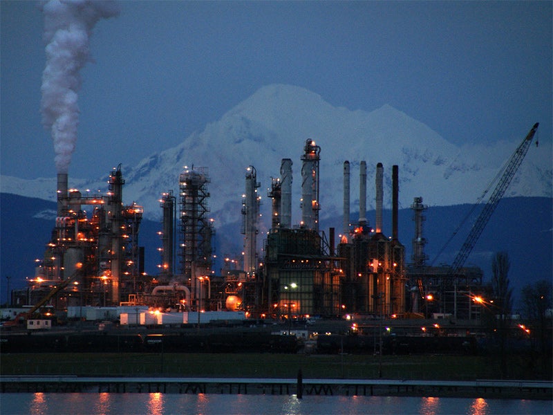 Oil refinery in Anacortes, WA, with Mt. Baker in the background.