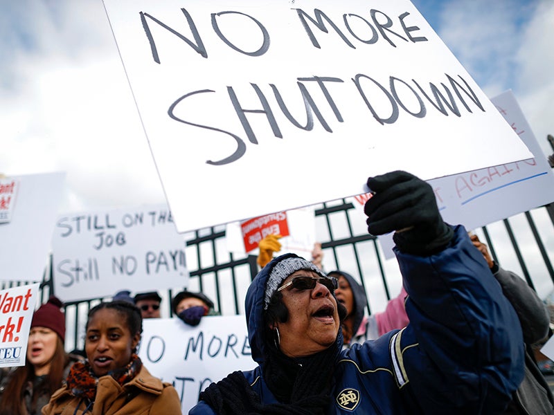 Union members and IRS workers rallied against the federal government shutdown in Covington, Kentucky, on Jan. 10, 2019.