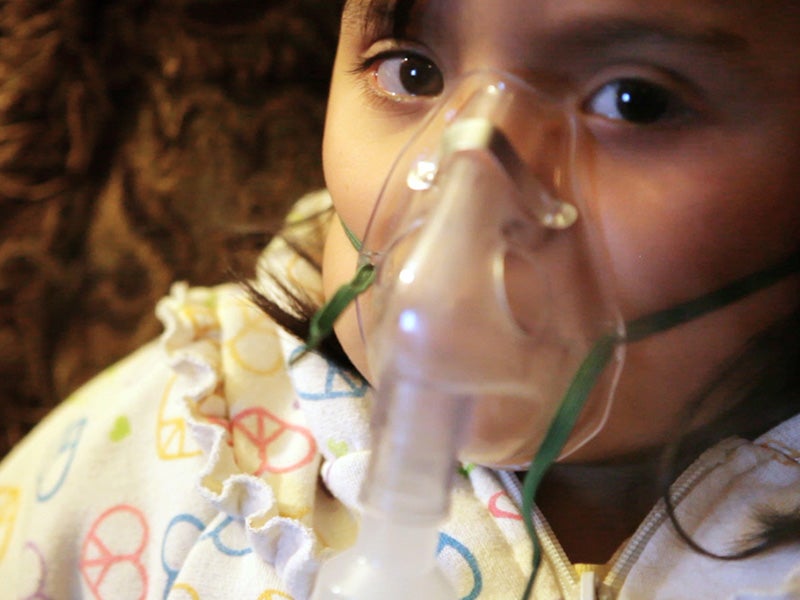 A child suffers from asthma.