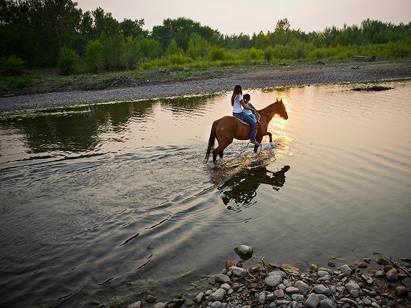 Kendall Edmo with her daughter, in the sacred Badger-Two Medicine area.