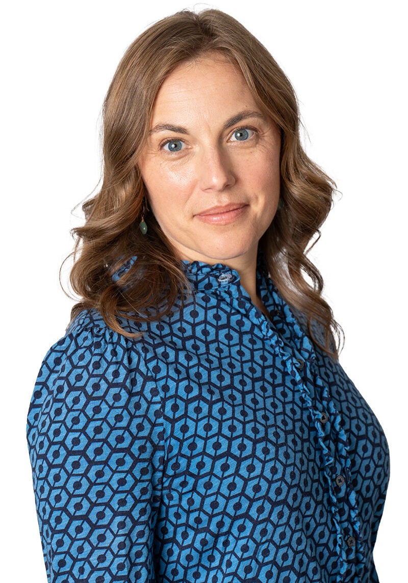 Aurora Janke, a senior attorney with Earthjustice's Northwest Regional Office, is looking directly at the camera.