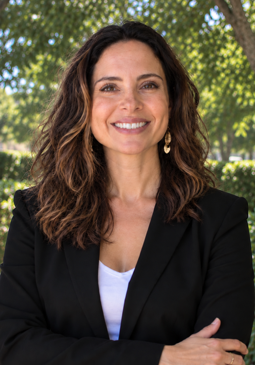Christine Santillana, senior legislative counsel with Earthjustice's Policy and Legislation team, is smiling and looking at the camera.
