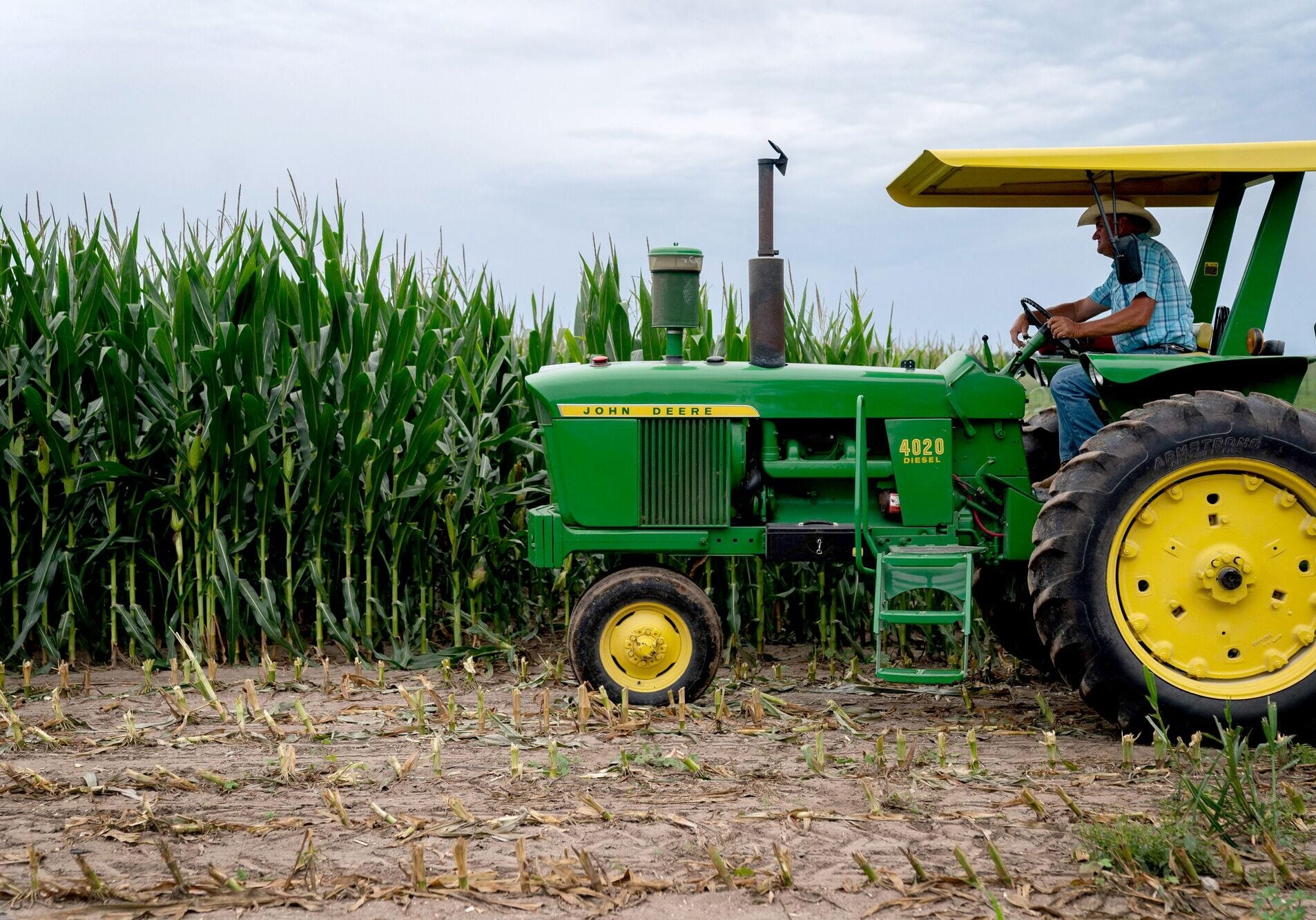 Agriculture Drought Steve Swenka prepares to chop up corn stalks in Tiffin, Iowa, on August 13, 2023. Most of Iowa was experiencing drought at this time, including Swenka's farm. (Stefani Reynolds / AFP via Getty Images)