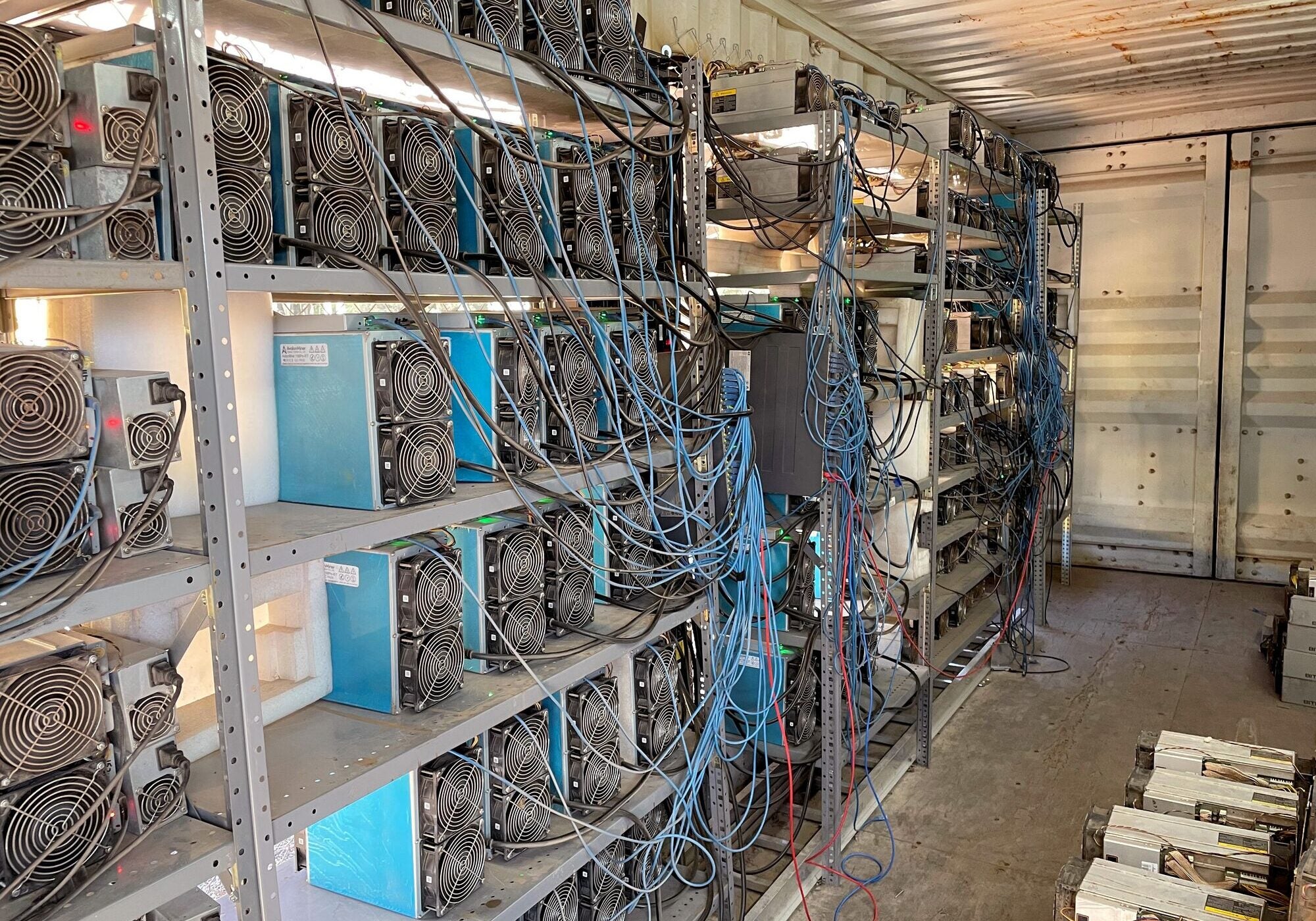 Racks of computers in a shed.