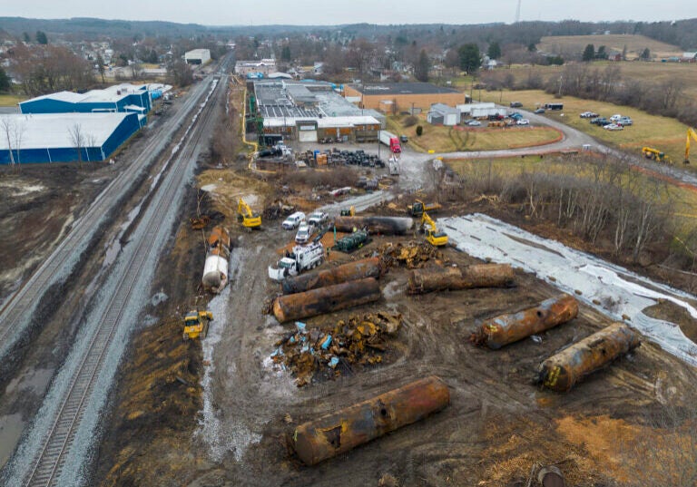 Aerial photo of the wreckage of burned chemical train cars.