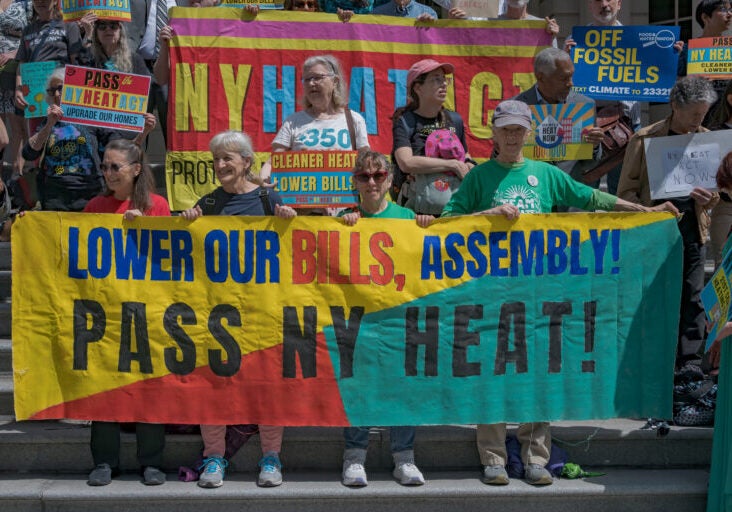 Over 100 New Yorkers joined environmental organizations on Earth Day at the steps of City Hall to rally for the NY HEAT Act, a major climate and affordability bill that would cut emissions and saving low and moderate income New Yorkers an average of $136 per month. (Erik McGregor / LightRocket via Getty Images)