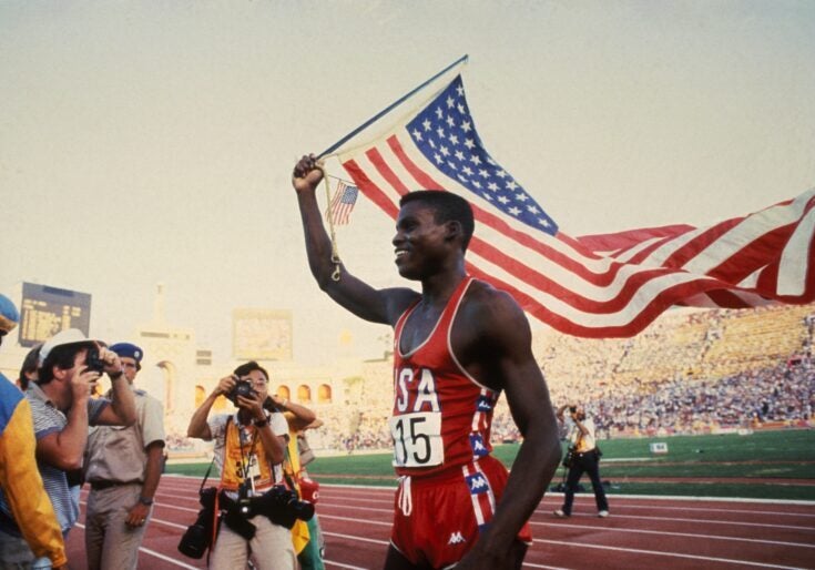 American athlete Carl Lewis won the 100m gold medal at the Los Angeles Olympic Games in August 1984 in Los Angeles, California.