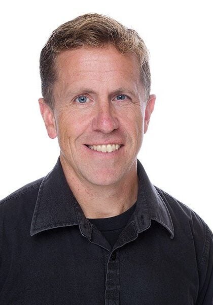 Jan Hasselman, a senior attorney in Earthjustice's Northwest Regional Office, is smiling and looking directly at the camera.