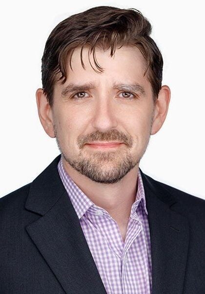 Ian Coghill, senior attorney with Earthjustice's Rocky Mountain Office, is looking directly at the camera.