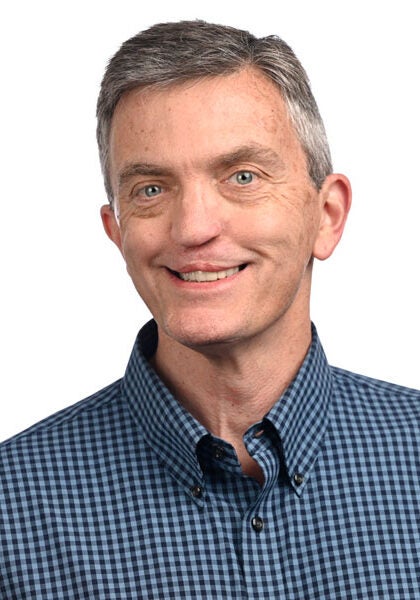 Michael Freeman, senior attorney in Earthjustice's Rocky Mountain Office, is smiling, looking directly at the camera.
