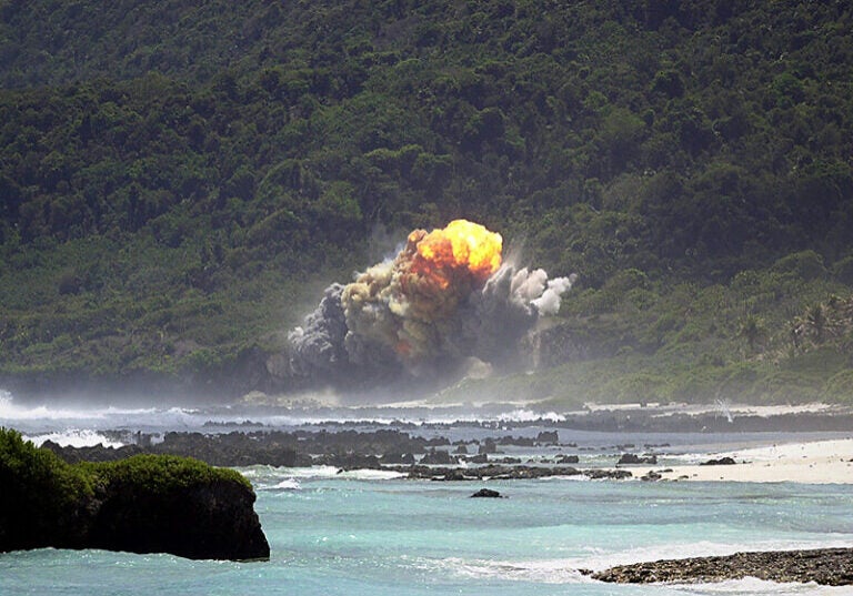 A fireball rises above the 36th Explosive Ordnance Disposal (EOD) Tarague range seconds after the detonation of an M117 bomb, as a part of the flight's training, on Andersen Air Force Base (AFB), Guam.