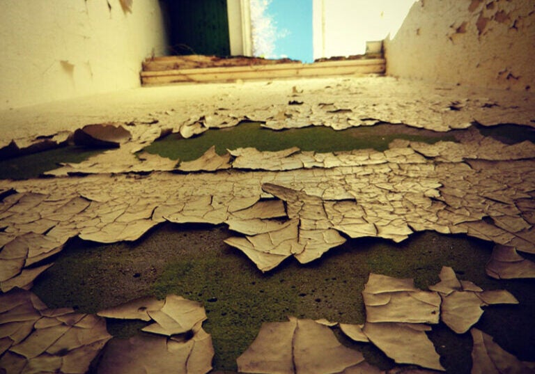 Peeling paint in an old building.