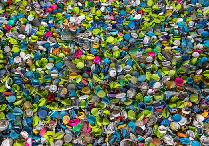 Bottle caps are collected to be sent to a recycling factory for processing in Nakon Pathom, Thailand.