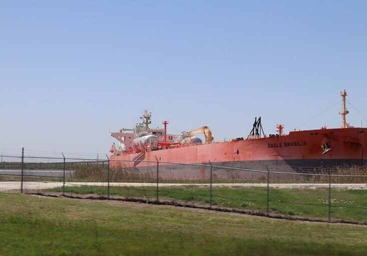 Oil tanker loading at onshore terminal in the Gulf of Mexico in Port Arthur, Texas.