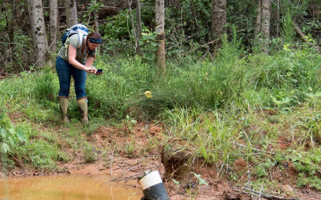 Savannah Riverkeeper Tonya Bonitatibus documents pollution around the Anderson County pipeline spill in 2016.
(Image Courtesy of Mike Mather / SELC)
