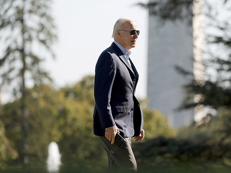 President Joe Biden walks on the South Lawn after he returned to the White House on October 10, 2022 in Washington, D.C.