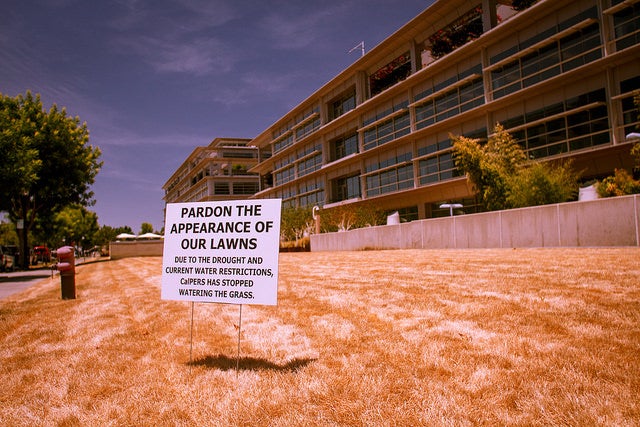A sign indicating water restrictions in California.