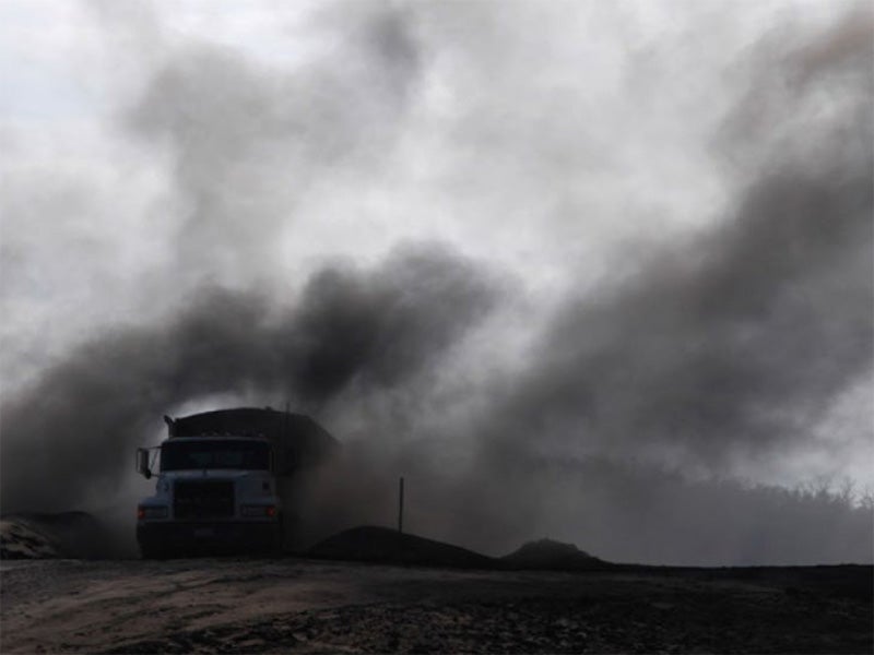 Toxic coal ash dust at the Making Money Having Fun Landfill in Bokoshe, OK.