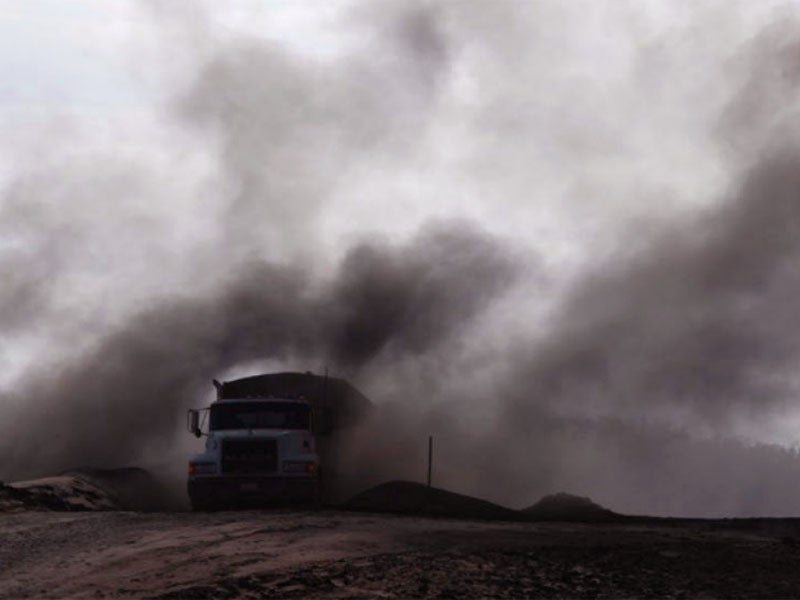 Toxic coal ash dust at the Making Money Having Fun Landfill in Bokoshe, OK.