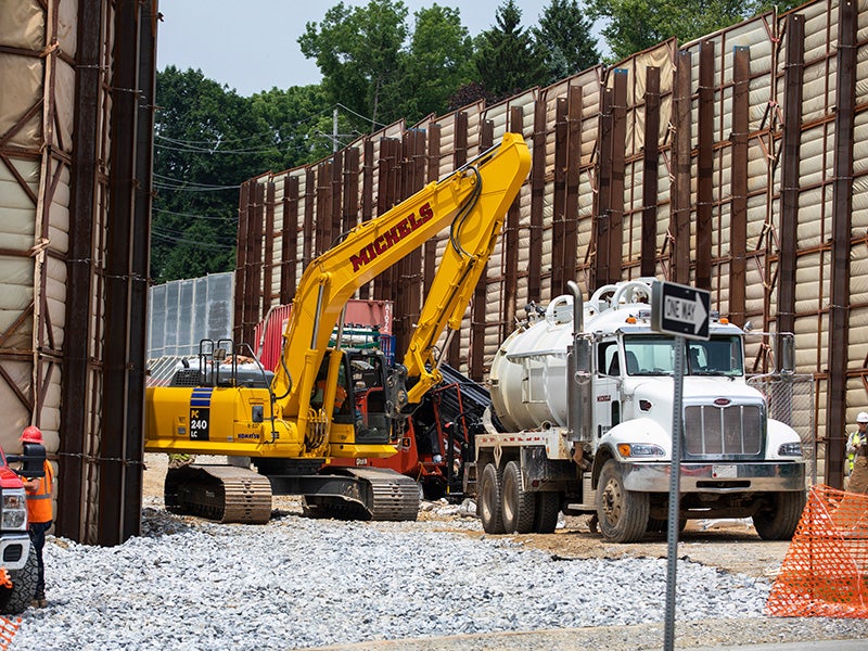 Heavy equipment is moved at a pipeline construction site in eastern Pennsylvania. The following day, heavy drilling liquid leaked out to the nearby street and residential area.