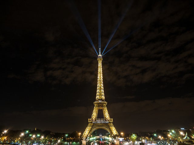 On the closing days of the Paris climate talks, an auspicious sign is illuminated on the Eiffel Tower
(Flickr user Yann Caradec)