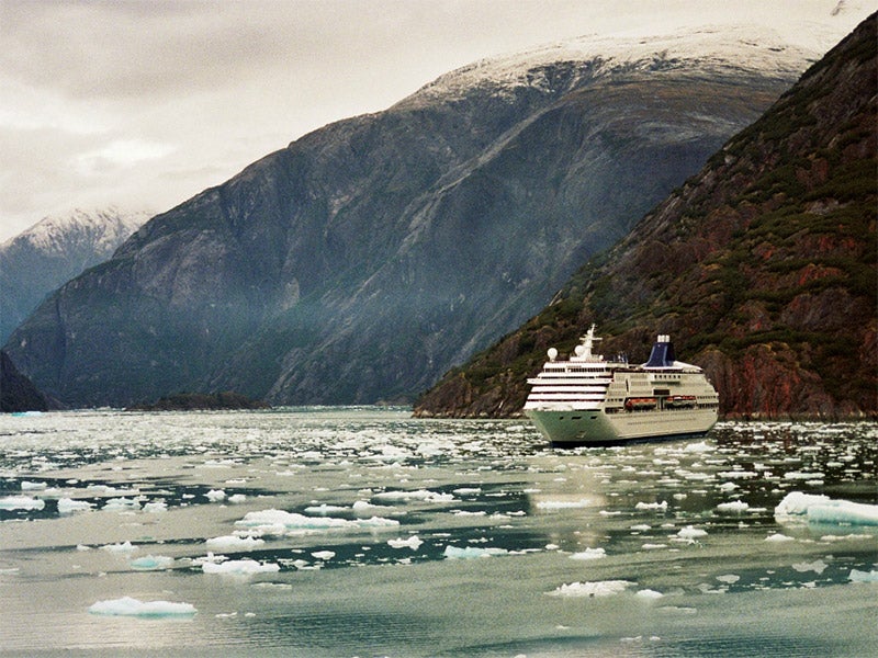 Cruise ship at Alaska&#039;s Tracy Arm Fjord. The ships dump wastewater into Alaskan coastal waters and leave partially-treated sewage, heavy metals and chemical pollutants in their wakes.