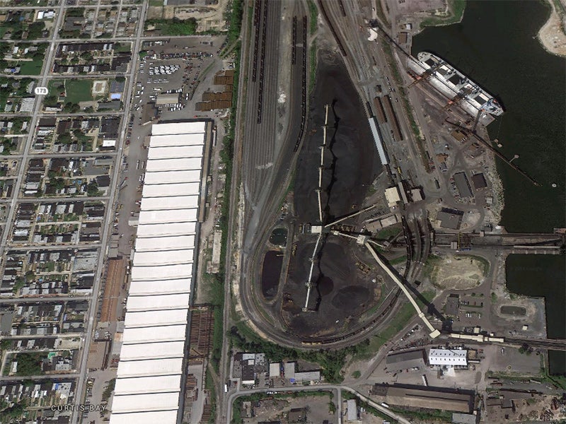 The CSX coal export and processing facility in Baltimore, MD. Neighboring communities already suffer from air and noise pollution generated by the rail traffic and facility operations.