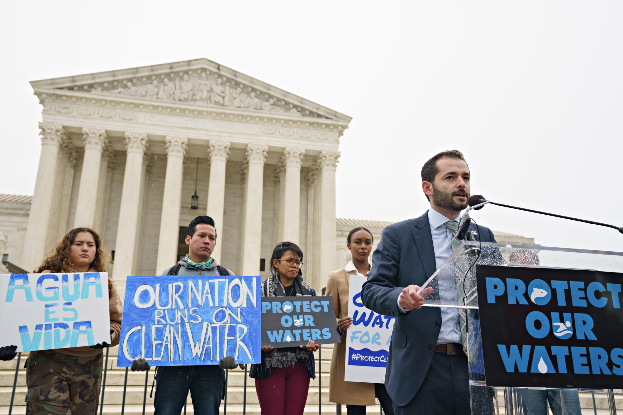 A few hundred supporters of clean water rallied outside the Supreme Court on Oct. 3, 2022, as the court heard oral arguments in Sackett v. EPA.