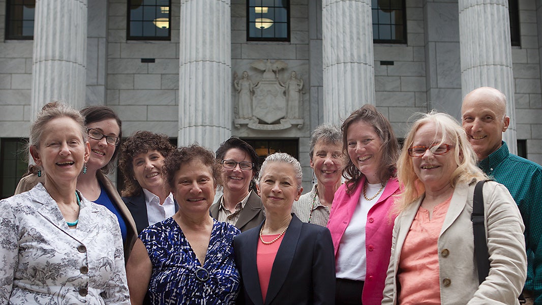 Residents of Dryden smile, with Helen Slottje and Earthjustice’s Deborah Goldberg and Kathleen Sutcliffe, after the high court argument in Albany.