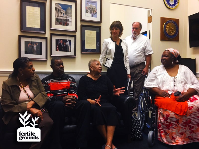 (From left to right) Lana Carter, Raeford Bennett, Elsie Herring, Elizabeth Haddix, Larry Baldwin and Naeema Muhammed explain to staffers at North Carolina Congresswoman Alma Adams’ office how severely industrial swine facilities disrupt rural lives.