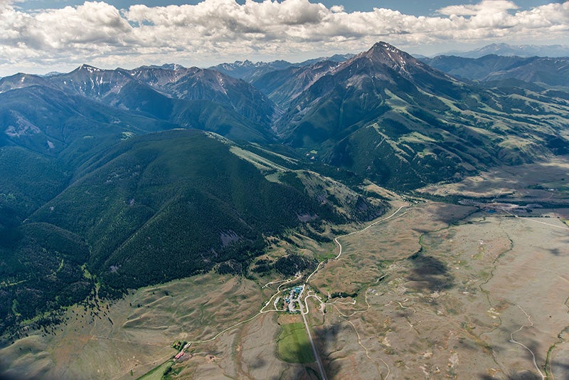 Near the northern entrance of Yellowstone National Park. Emigrant Peak and the Emigrant Gulch proposed mining area lies behind the locally-owned, world famous Chico Hot Springs Resort. There are mine claims on both sides of the gulch on both private and public land. (Photo by William Campbell / Aerial flight by Bruce Gordon / Ecoflight)